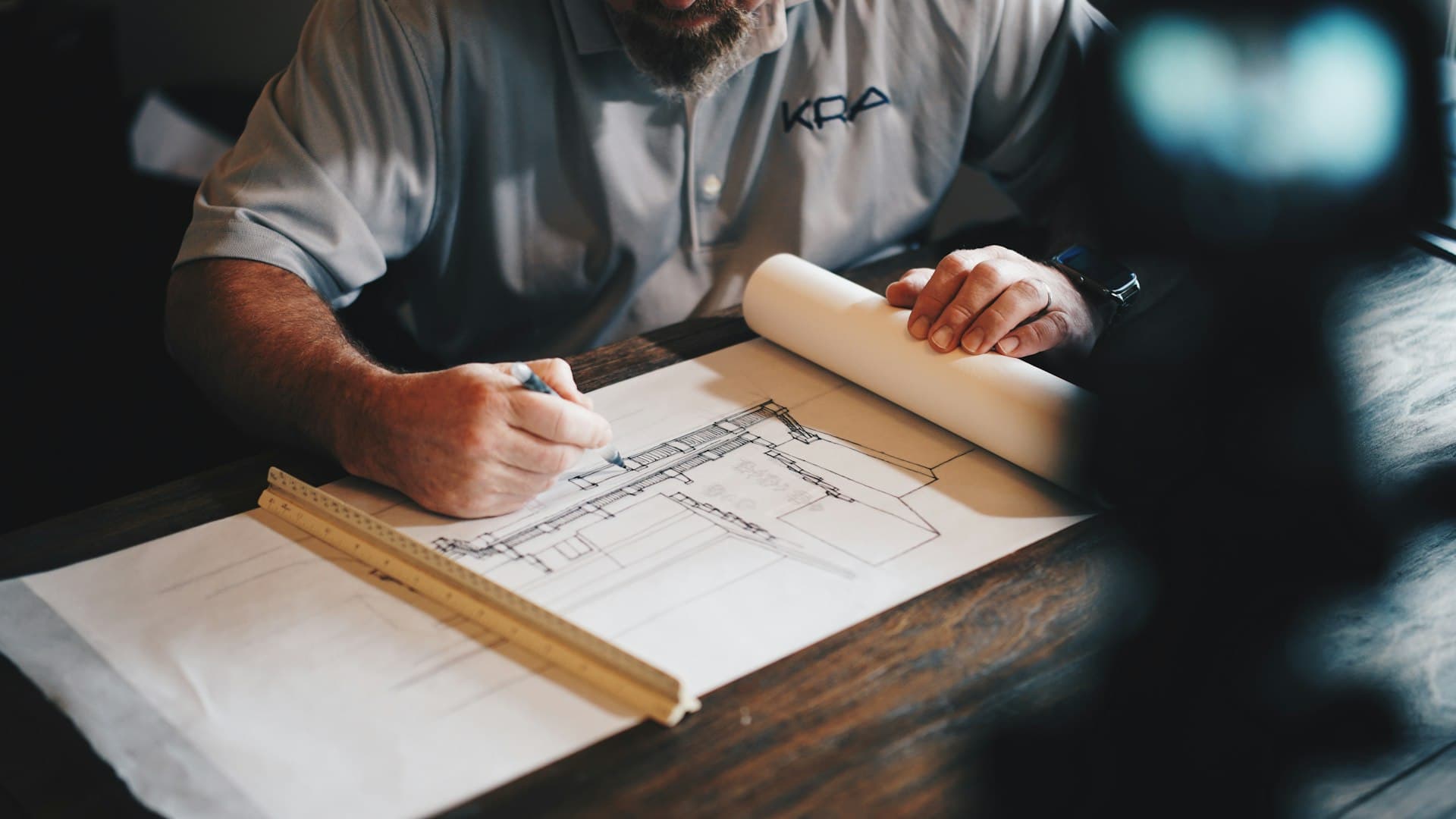 Construction professionals reviewing project plans